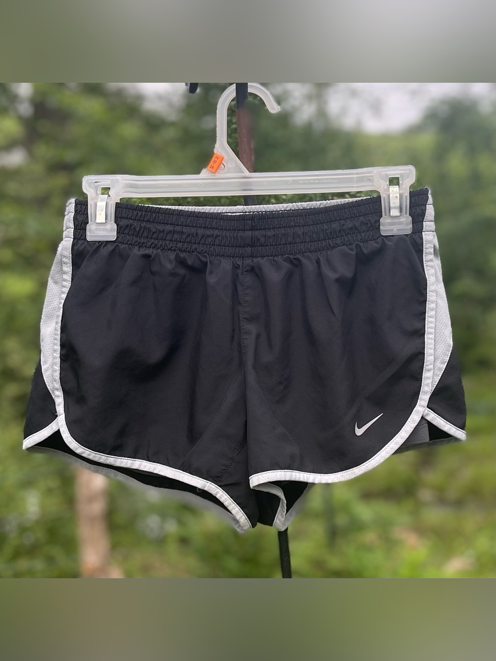 Nike women’s Black Running Shorts with White Trim Size S. Waist 27”